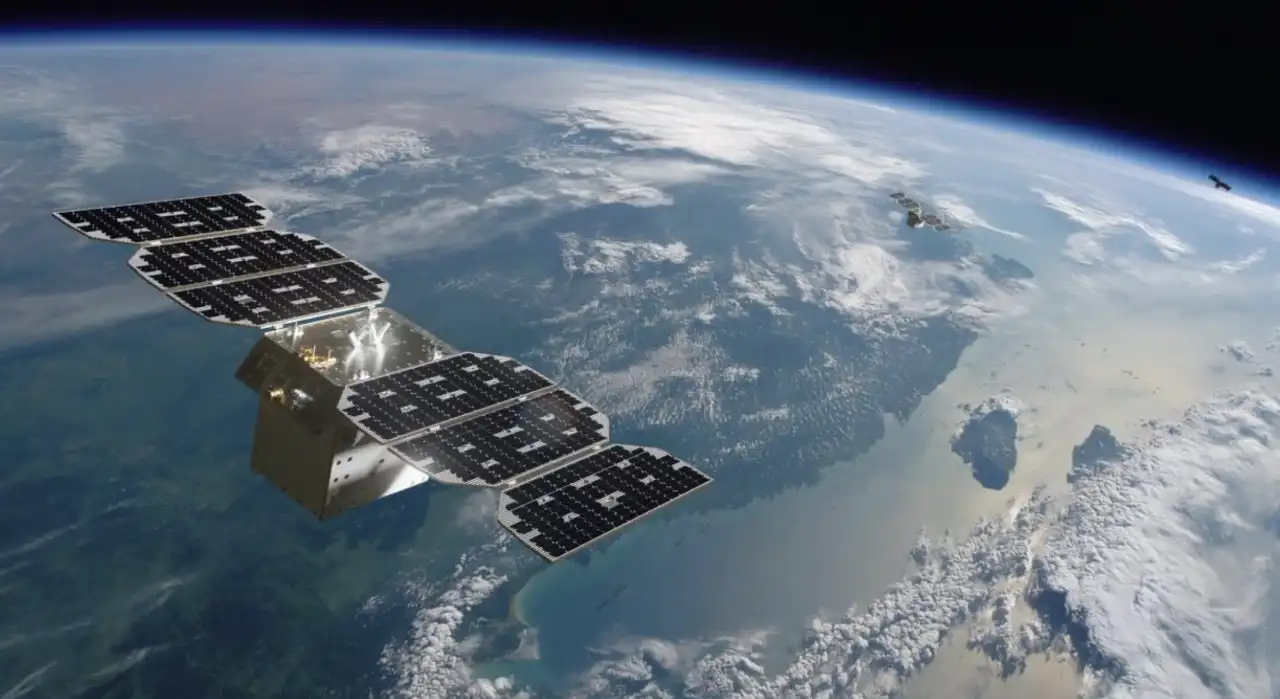 Representação artística de um data center futurista em órbita terrestre, com painéis solares para captação de energia e sistemas de resfriamento. Ao fundo, o planeta Terra em destaque.