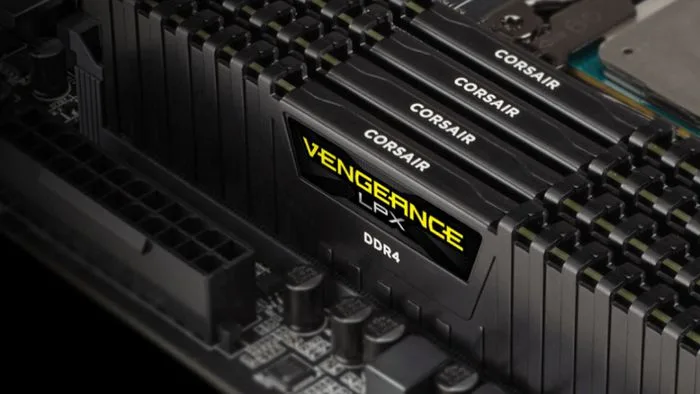 Módulos de memória RAM DDR4 dispostos em uma placa-mãe, simbolizando o hardware de computadores e o impacto da demanda por IA.