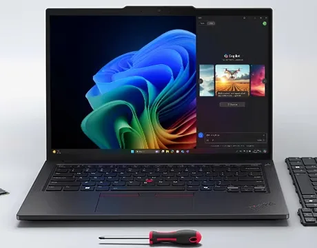 Thinkpad T14 Gen 6 fechado ao lado do carregador USB-C, pronto para uso portátil